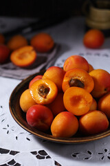 Wall Mural - Fresh ripe apricots in bowl in rustic style