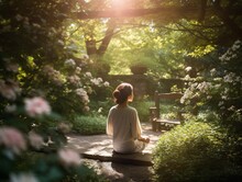 A Woman Meditating In A Peaceful Garden, Surrounded By Blooming Flowers And Tall Trees, As Rays Of Soft Sunlight Gently Filter Through The Foliage . Generative AI. 