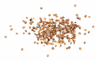 Wall Mural - Coriander seeds macro isolated on white background, top view 