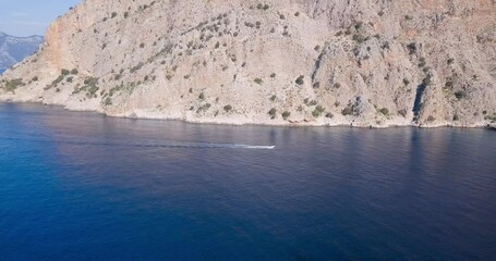 Canvas Print - Drone video of a boat entering the Butterfly Valley Kelebekler Vadisi in Fethiye