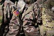 © Dragoș Asaftei - United States Army. Close up photo with the flag of America on soldiers shoulder uniform, US army concept image.