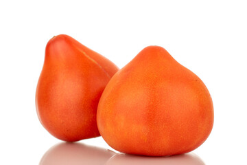 Two juicy red tomatoes, macro, isolated on white background.