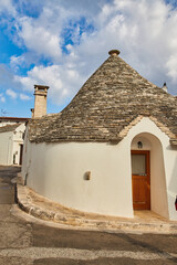 Canvas Print - Alberobello, Puglia, Italy: Cityscape over the traditional roofs of the Trulli