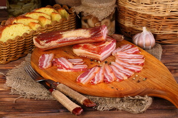 Assorted sausages on a wooden board