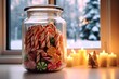 Striped candy canes in a frosted glass jar, against a snowy window scene in the background.