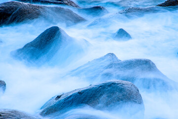 Poster - surf of the atlantic ocean with crabs in long time exposure