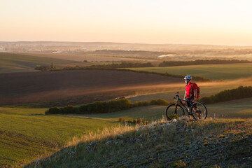 Sticker - Traveler in red jersey and white helmet ride a bike on autumn background