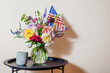 Independence day of America. Usa flag put in vase with flowers. Interior decor for July 4th. Memorial day. Space