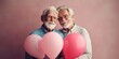 © ArtCraft - A mature LGBT gay married couple of pensioners who are happy in love and have a matching outfit of pastel colors. Love that lasts forever. Gays holding a heart shaped balloon. Generative AI