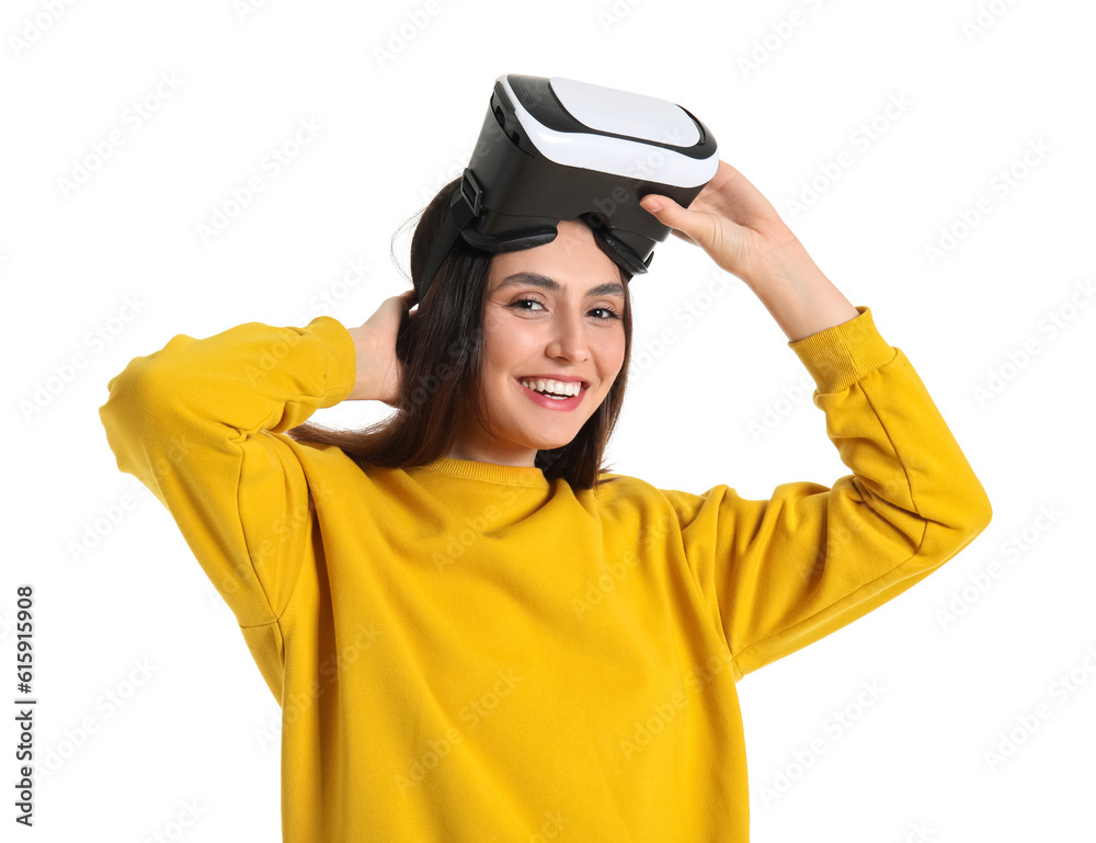 Happy young woman with VR glasses isolated on white background