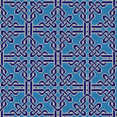 Poster - Knitted seamless vector pattern similar to ornate lattice as a fabric texture in blue and white colors
