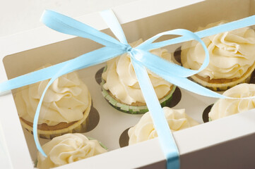 Sticker - a gift box with cupcakes. present for your loved ones. concept of gift