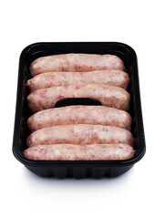 Wall Mural - Plastic tray of raw pork beef sausages isolated on white