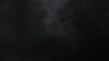 Abstract White Smoke In Slow Motion. Smoke, Cloud Of Cold Fog In Light Spot Background. Light, White, Fog, Cloud, Black Background, 4k, Ice Smoke Cloud. Floating Fog.