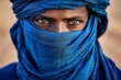 Tuareg man in authentic national blue clothes with a covered face. AI generated, human enhanced