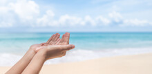 Hands Do Pray Position On Nature Summer Beach And Blue Sky Background.