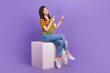 Wall Mural - full length photo of adorable pretty lady wear trendy clothes arms presenting empty space special of