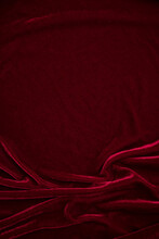 Red Velvet Fabric Texture Used As Background. Red Panne Fabric Background Of Soft And Smooth Textile Material. Crushed Velvet .luxury Scarlet For Silk.