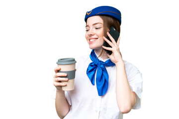 Poster - Airplane stewardess over isolated chroma key background holding coffee to take away and a mobile