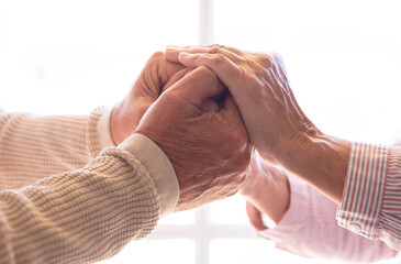 Wall Mural - Old people holding hands close up view, senior retired family couple express care and psychological support concept, trust in happy marriage, empathy hope