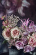 Beautiful bouquet of spring flowers in a vase on the table. Lovely bunch of flowers. Soft focus.

