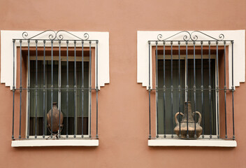 Building with beautiful windows and steel grilles