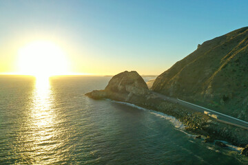 Wall Mural - Sunset at Mugu Rock along the Pacific Coast Highway in Malibu, CA