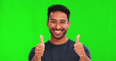 Leinwandbilder - Face, thumbs up and happy man in green screen studio background with hand, like sign and thank you. Smile, portrait and asian person with yes emoji, vote or positive review, feedback or agreement