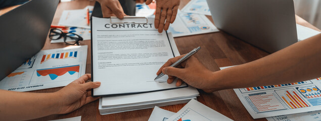 Poster - Panorama shot hand signing signature on legal contract, business report and BI Fintech paper on table. Seal business agreement deal with signature. Investment loan for startup company. Scrutinize