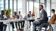 © rodrigodm22 - business people working together in a wheelchair