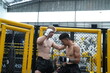 © FotoArtist - Two professional boxers fighting at the gym