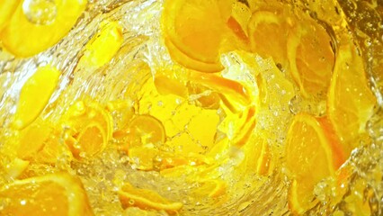 Fototapete - Super Slow Motion of Water Wave with Orange Slices. Water Surf Wave Rotating Around in Creating Tunnel Shape. Filmed on high speed cinema camera, 1000 fps. Speed Ramp Effect.