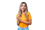 Young Uruguayan woman over isolated background laughing