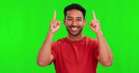 Poster - Pointing up, happy and face of Asian man on green screen for promotion, branding and selection. Advertising, hand gesture and portrait of excited male person for deal, news and announcement in studio