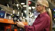 © Robert Peak - Attractive mature woman shopping for solar lights for garden and compares them in a hardware store shopping.