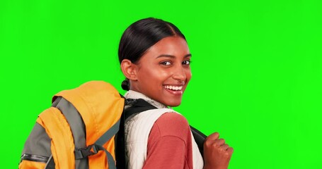 Wall Mural - Hiking, smile and turn with a woman on a green screen background in studio to explore for adventure. Portrait, happy and backpack with a young female hiker looking excited on a trip against chromakey