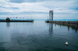 Germany, Friedrichshafen city coast of bodensee lake with viewpoint tower of stairs at the harbor and silen water