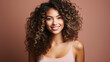© AS Photo Family - Portrait of a beautiful young woman with curly hair on a brown background. Generative AI.