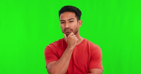Leinwandbilder - Thinking, doubt and face of an Asian man on a green screen for a solution, planning or ideas. Serious, question and portrait of a young person with a problem in mind isolated on a studio background