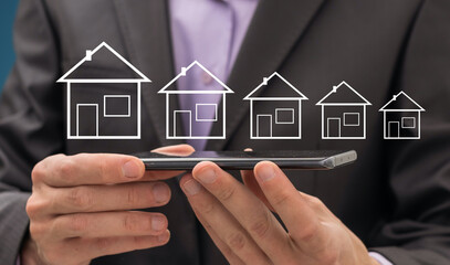 Poster - Business man hand house model in screen
