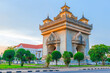 Patuxay a tall tower sunset with street Vientiane laos