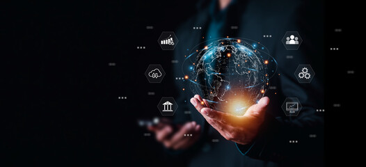 Businessman or Analyst working with Business Analytics and Data Management System on virtual screen,Corporate strategy for finance, operations, sales, marketing.