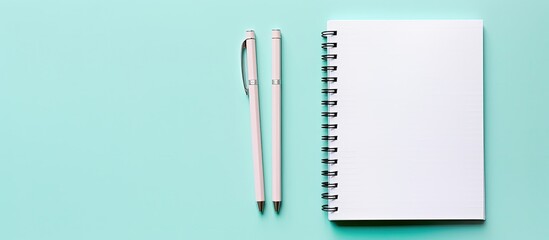 Fototapete - A notebook and pen on a blue background created with Generative AI technology