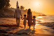 Multiethnic family walking on the beach at sunset on summer