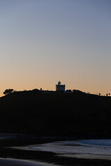 Wall Mural - Silhouette of Tacking Point Lighthouse at Port Macquarie, Australia.