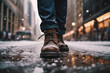 Leinwandbild Motiv Close-up image of winter footwear navigating a snowy city street. Detailed view showing the shoes, snowfall and forming puddles, illustrating typical winter weather conditions