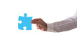 Isolated  businessman holds a piace of puzzle. Concept teamwork, partnership, integration