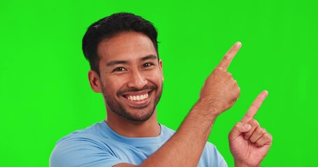 Poster - Pointing, excited and face of Asian man on green screen for promotion, branding and selection. Advertising, hand gesture and portrait of happy male person with deal, news and announcement in studio