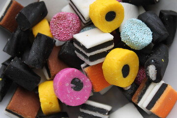 Full frame view of assorted English liquorice candy.