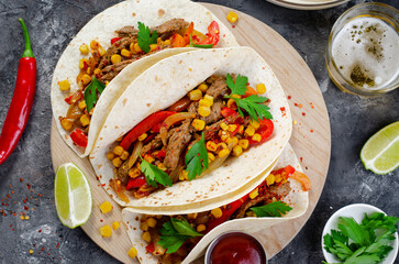 Wall Mural - Mexican Tacos with Beef and Vegetables, Tacos al Pastor on Dark Background